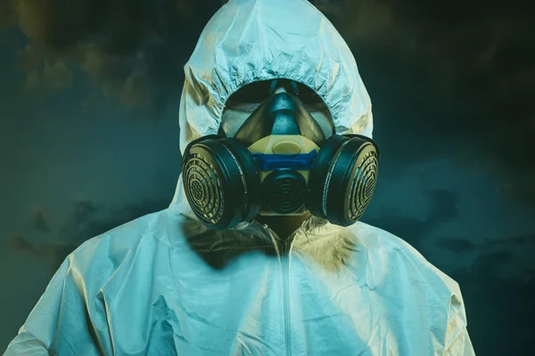 Sick, air contaminated by pollution, man with mask and protective suit, concept of biological diseases and environmental problems