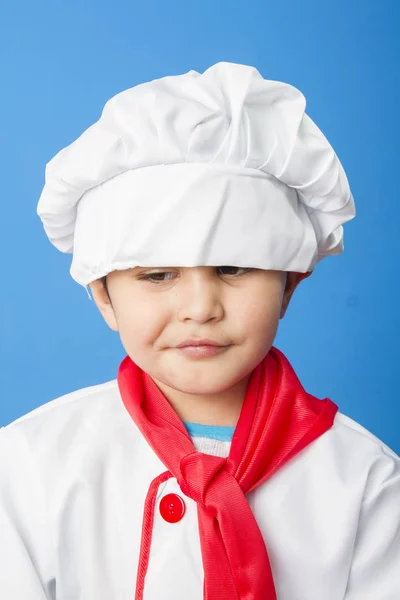 Petit Garçon Costume Cuisinier Sur Fond Bleu — Photo