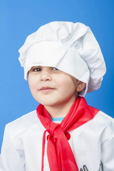 Petit Garçon Costume Cuisinier Sur Fond Bleu — Photo