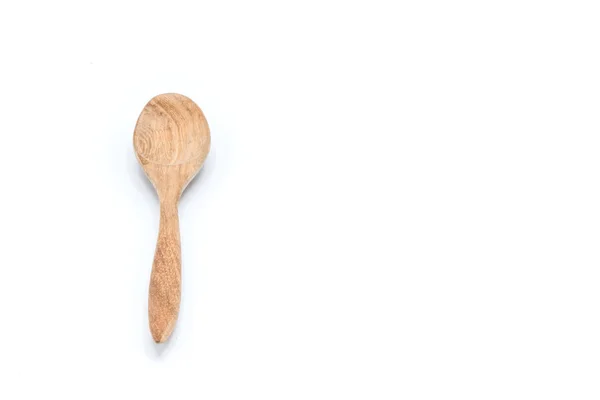 Wooden spoon on the white background — Stock Photo, Image