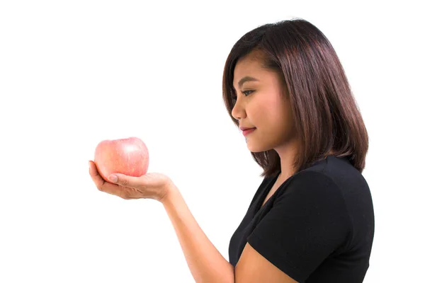 Young Asian woman holding light red apple on white background. Portrait of beautiful Asian woman holding light red apple for healthy eating diet concepts. healthy food concept. life style concept. — Stock Photo, Image