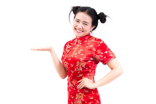 Young asian woman wearing chinese dress traditional cheongsam with gesture of congratulation, Looking at the camera and smile in Chinese New Year Festivities, New Year Celebration on white background. — Stock Photo, Image