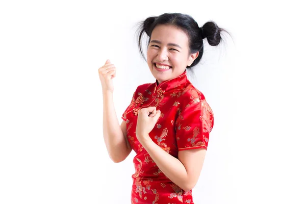 Young asian woman wearing chinese dress traditional cheongsam with gesture of congratulation, Looking at the camera and smile in Chinese New Year Festivities, New Year Celebration on white background. — Stock Photo, Image