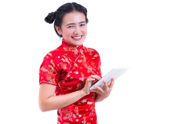 Beautiful Young asian woman wearing chinese dress traditional cheongsam or qipao. Hands holding and using laptop. Online shopping. Concept of buying digital online. Hand touching tablet, social media. — Stock Photo, Image