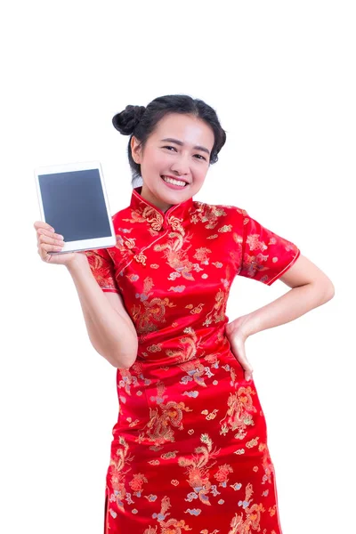 Beautiful Young asian woman wear chinese dress traditional cheongsam or qipao. Hand holding blank screen digital tablet. isolated on white background, Concept buying digital online, technology. — Stock Photo, Image