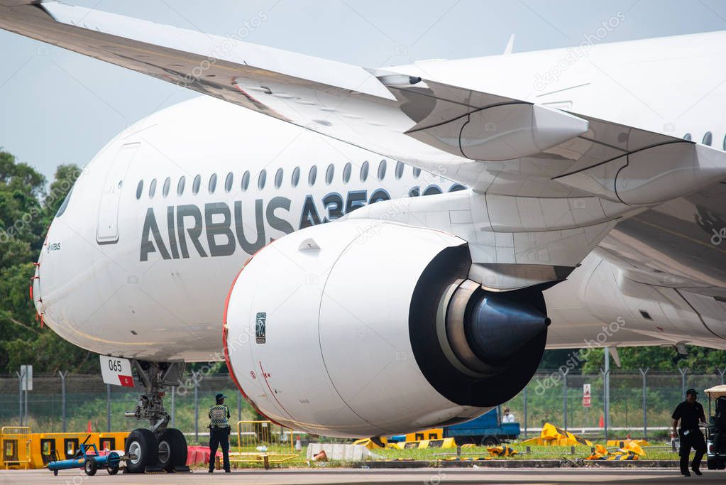 Singapore - February 4, 2018: The Rolls-Royce Trent XWB engine of an Airbus A350-1000 XWB in Airbus factory livery during Singapore Airshow at Changi Exhibition Centre in Singapore.
