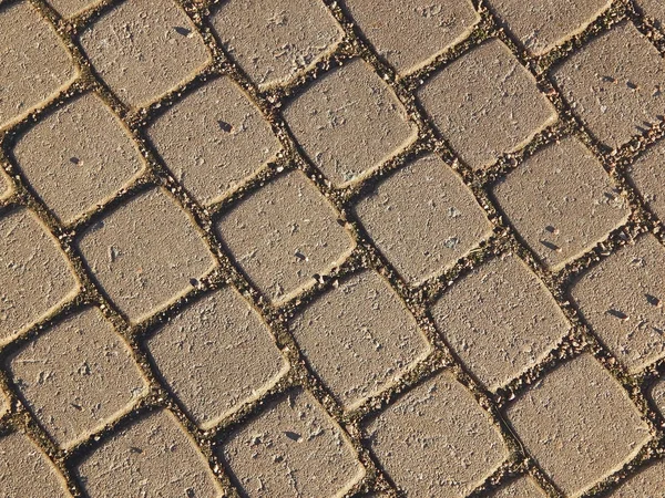 Strukturierter Hintergrund eines Pflastersteins — Stockfoto