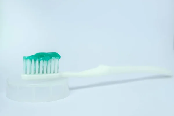 Toothbrush on the white background — Stock Photo, Image