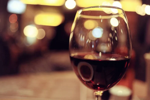 Glass of red wine on table — Stock Photo, Image