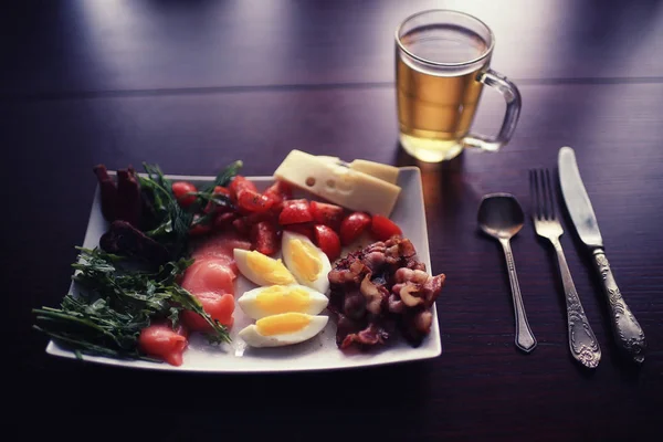 Serving cutlery on tablecloth — Stock Photo, Image