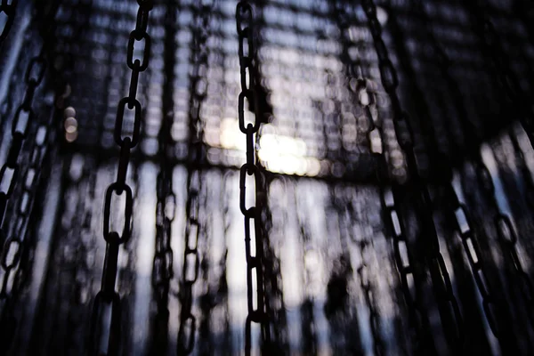 Dark hanging chains — Stock Photo, Image
