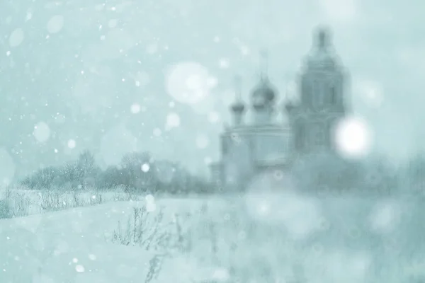 Church in snowy village — Stock Photo, Image