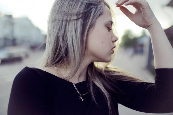 Blonde with long hair outdoors — Stock Photo, Image