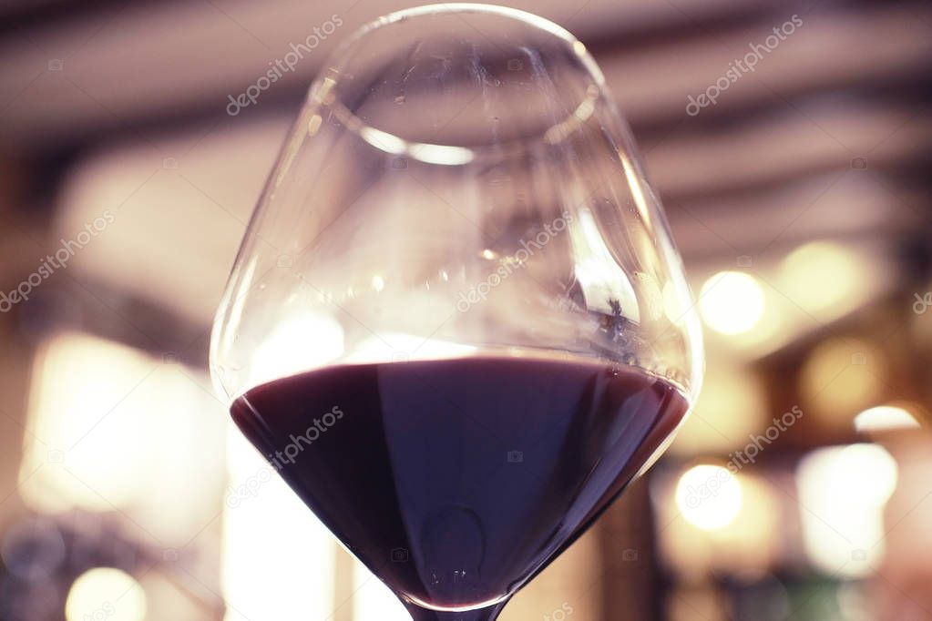 Serving a glass of red wine