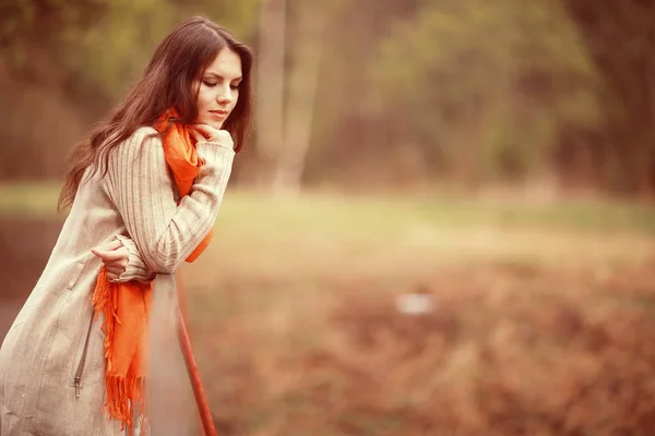 Pensive girl in park — Stock Photo, Image