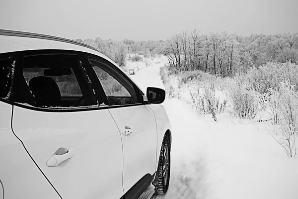 Car in a snowy landscape — Stock Photo, Image