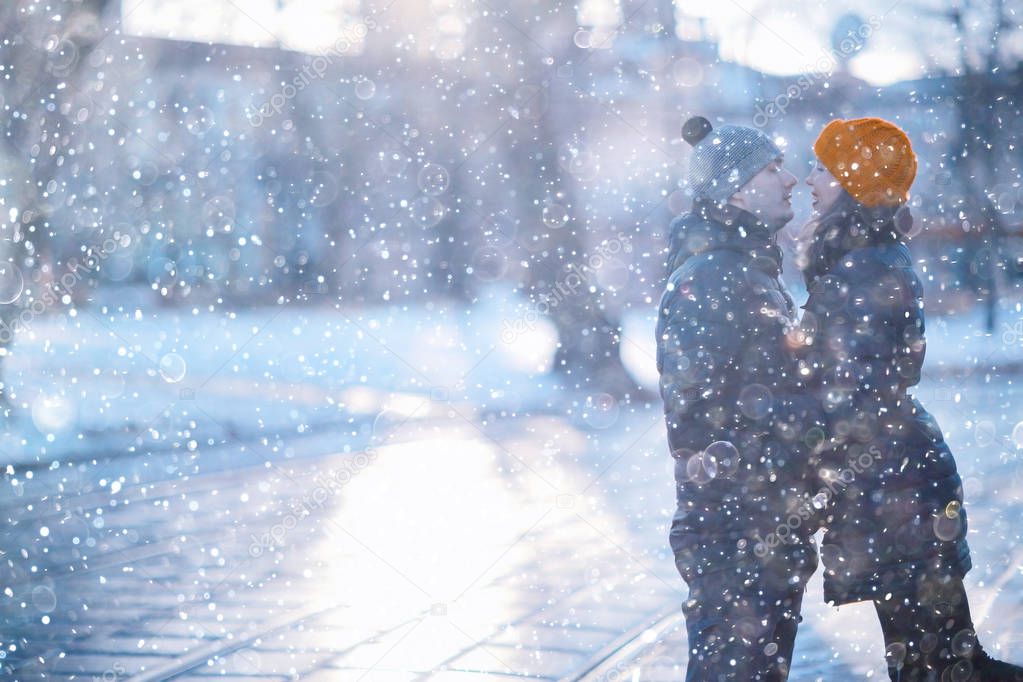 man and woman in a city park