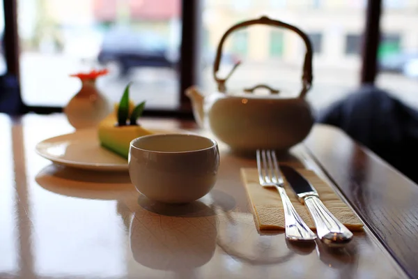 Serving cutlery on tablecloth — Stock Photo, Image