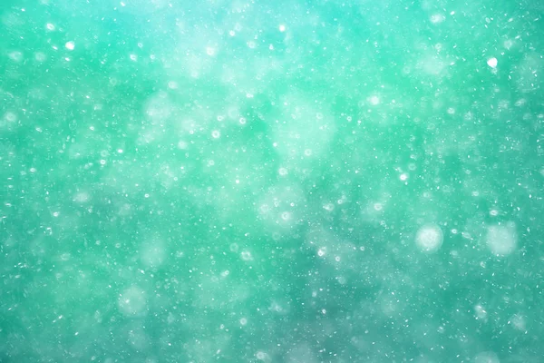 texture of snowflakes on blurry background