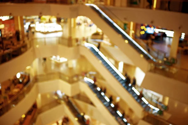 Fundo borrado em um shopping center — Fotografia de Stock