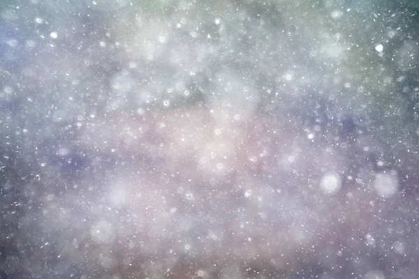 Textura de flocos de neve no fundo embaçado — Fotografia de Stock