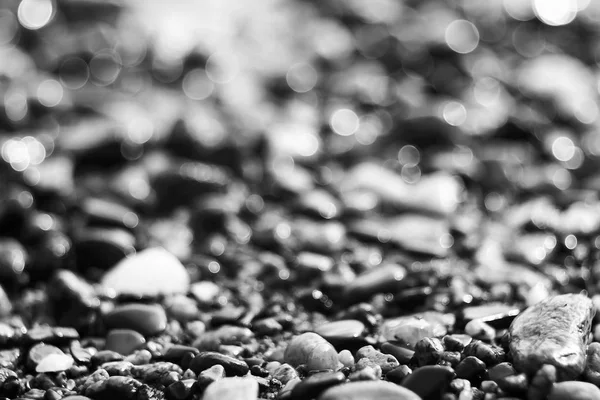 Pebble textuur aan de rivieroever — Stockfoto