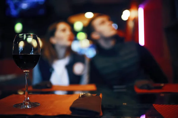 Glass of wine on table — Stock Photo, Image