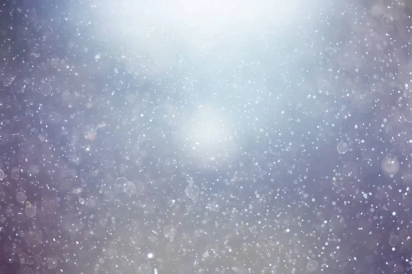 Texture des flocons de neige sur fond flou — Photo