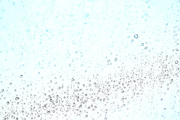 Raindrops flowing  down the glass — Stock Photo, Image