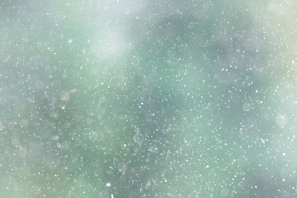 texture of snowflakes on blurry background 