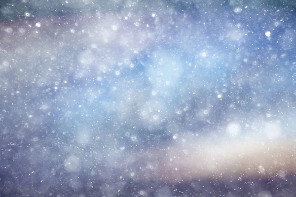 Texture di fiocchi di neve su sfondo sfocato — Foto Stock