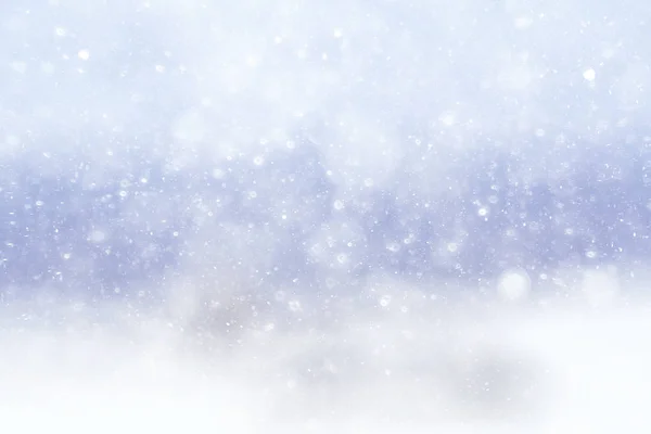Structuur van de sneeuwvlokken op onscherpe achtergrond — Stockfoto