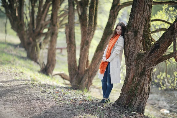 young woman in spring forest