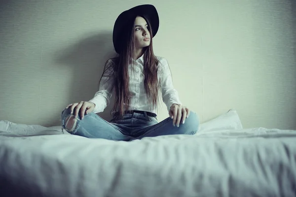 Teenage girl in black hat — Stock Photo, Image