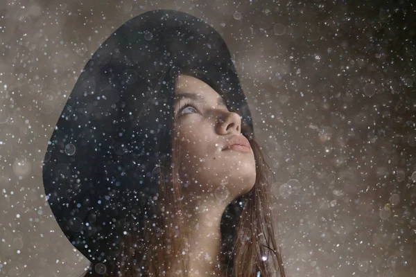 teenage girl in black hat