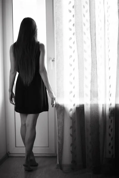 Teenage girl near window — Stock Photo, Image