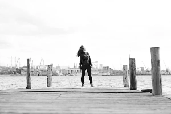 Young beautiful woman at pier — Stock Photo, Image