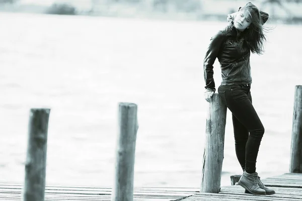 Young beautiful woman at pier — Stock Photo, Image