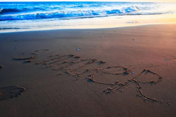 Napis na piasku — Zdjęcie stockowe