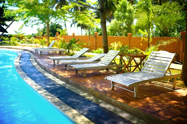 Pool with sun loungers — Stock Photo, Image