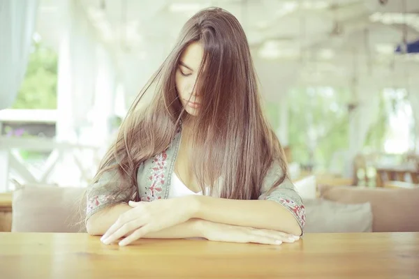 Young woman in cafe — Stock Photo, Image