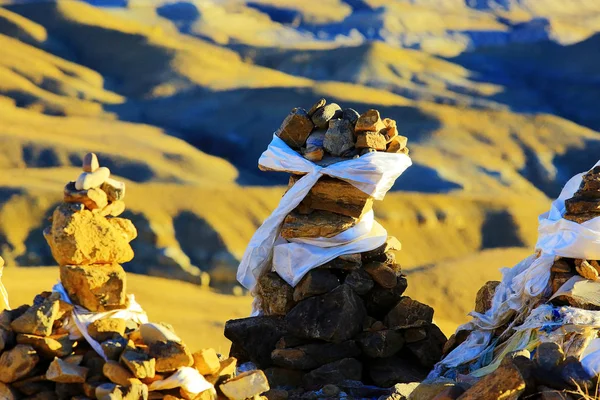 stacks of stones in beautiful mountains landscape