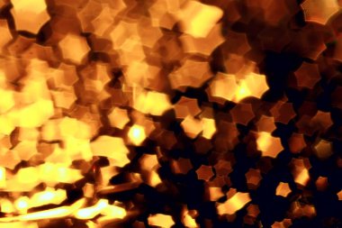 Altın bokeh ışıkları ile soyut sihirli doku, fantezi arka plan bulanık.   