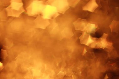 Altın bokeh ışıkları ile soyut sihirli doku, fantezi arka plan bulanık.   