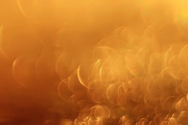 Altın bokeh ışıkları ile soyut sihirli doku, fantezi arka plan bulanık.   