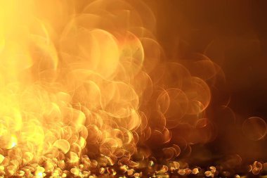 Altın bokeh ışıkları ile soyut sihirli doku, fantezi arka plan bulanık.   