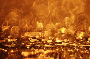 Altın bokeh ışıkları ile soyut sihirli doku, fantezi arka plan bulanık.   