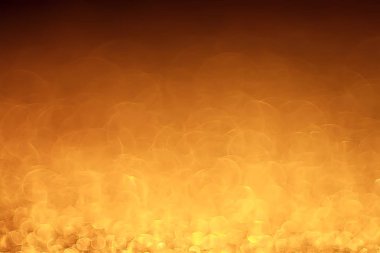 Altın bokeh ışıkları ile soyut sihirli doku, fantezi arka plan bulanık.   