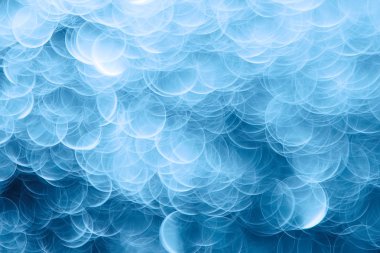 Mavi bokeh ışıkları ile soyut sihirli doku, fantezi arka plan bulanık.   