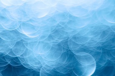 Mavi bokeh ışıkları ile soyut sihirli doku, fantezi arka plan bulanık.   